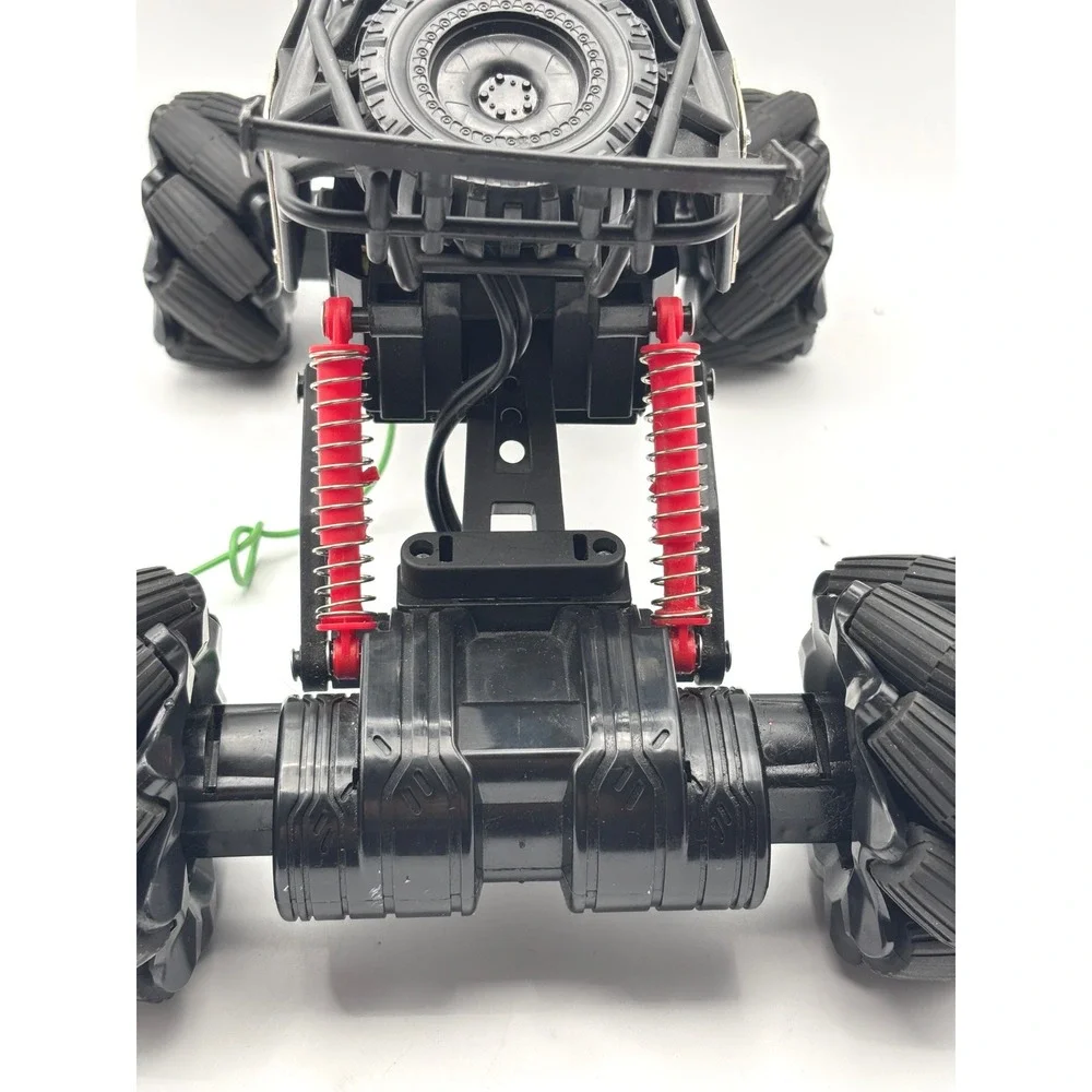 New Bright Slide Winder 4x4 RC Monster Truck Black Red Gold Roll Cage Toy